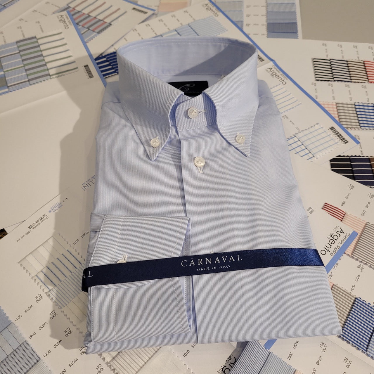 Our Italian made men's shirts are made using only the finest cotton from Albini and Thomas Mason. The collars are unfused and are available in both spread and cutaway. 