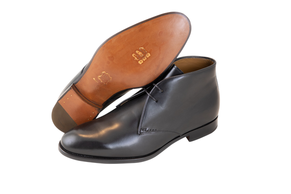 The Anil Chukka leather boot is a classic, plain toe design and made in Italy. This style of shoe is crafted with a Blake stitched leather sole construction and internal leather lining. 