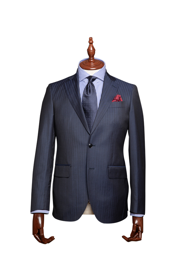 The perfect all rounder- The Caruso Italian men's suit will never date and  features an elegant navy shadow stripe from Vitale Barberis Canonico.   