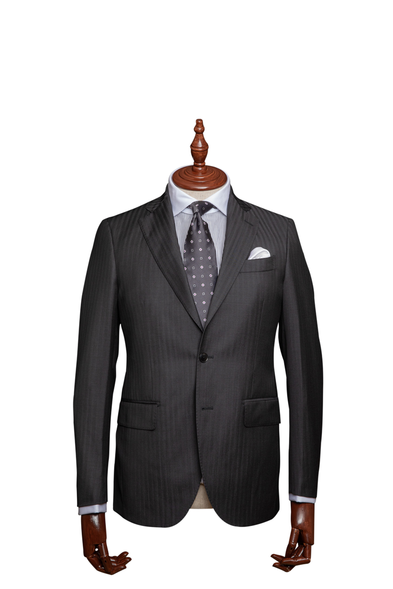 With this timeless classic there is no doubt that in this two piece charcoal shadow stripe you will be dressed to thrill. The Norman is made from a Vitale Barberis Canonico 100% Merino wool.